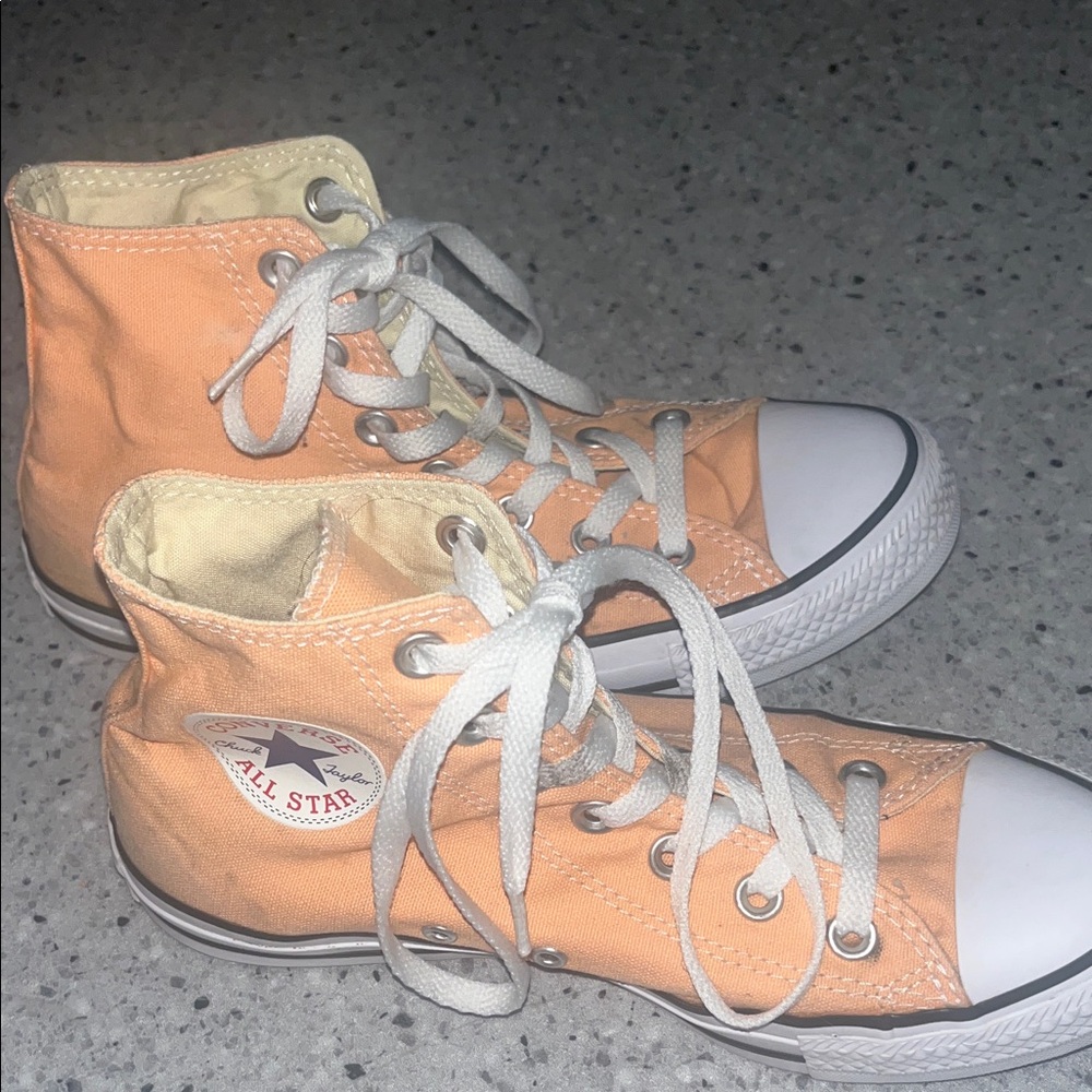 Orange high top converse